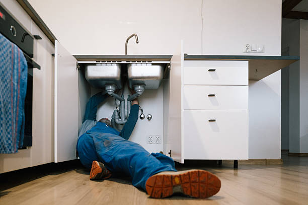 Professional Drain Cleaning technician working in Babson Park, MA